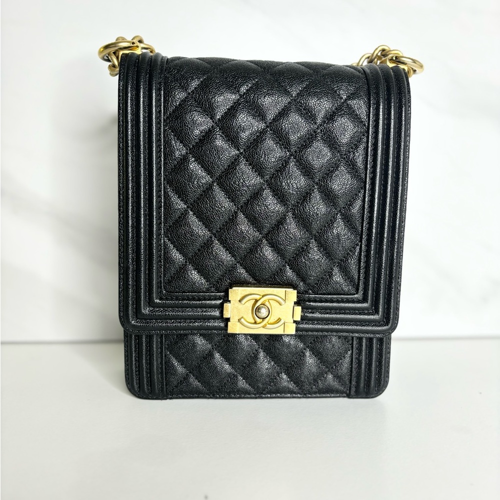 CHANEL Black North South Caviar leather boy bag